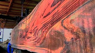 A rare phenomenon of black wood glowing red was discovered when sawing a sawmill